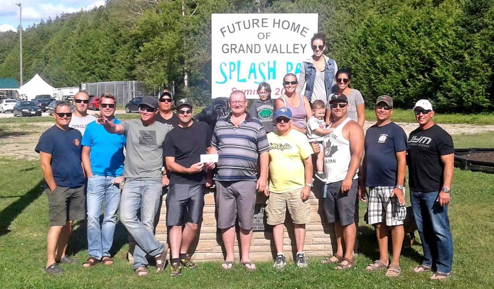 Grand Valley Firefighters associations make donation to splash pad post image