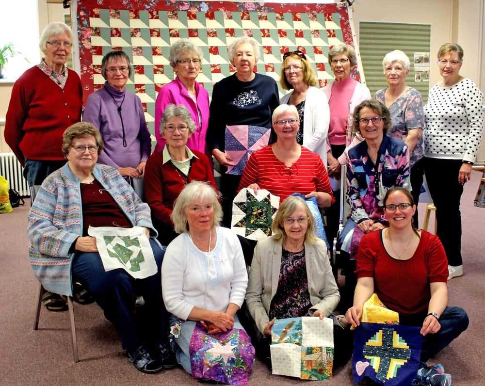 Sharing Our Faith Quilters celebrate 50 years supporting those in need post image