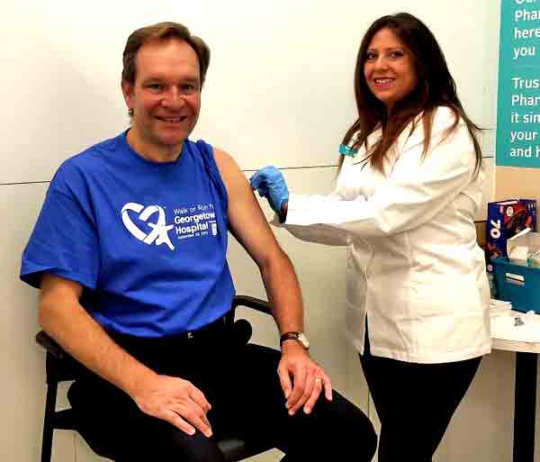 Wellington-Halton Hills MPP Ted Arnott rolls up his sleeve for Ontario’s free flu shot program post image