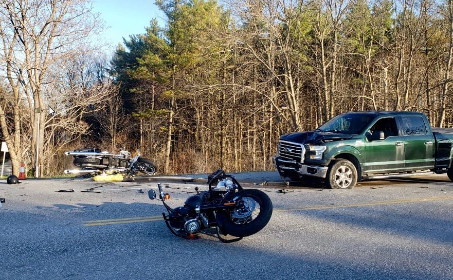 Man dead following crash between pickup, two motorcycles post image