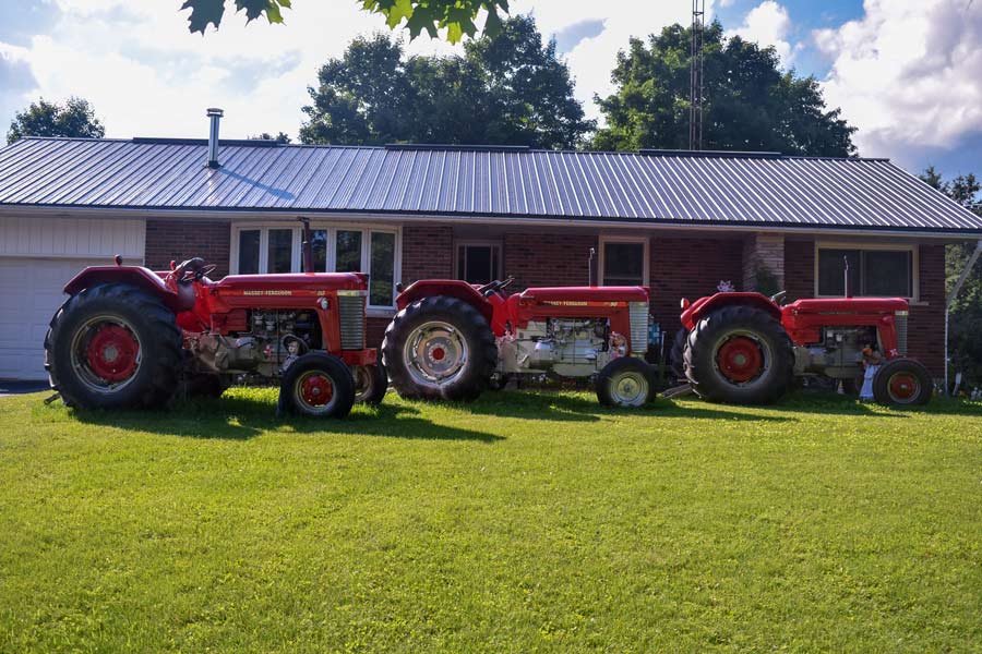 Belwood homeowner proudly displays antique tractors post image