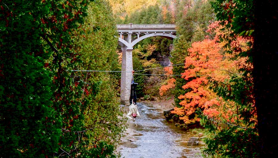 Magician escapes from straightjacket while suspended over Elora Gorge post image