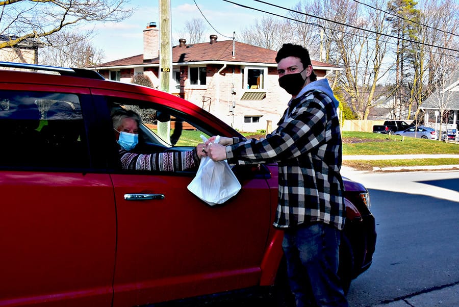 Church youth group hosts 'Drive Up & Drive On Dinners' post image