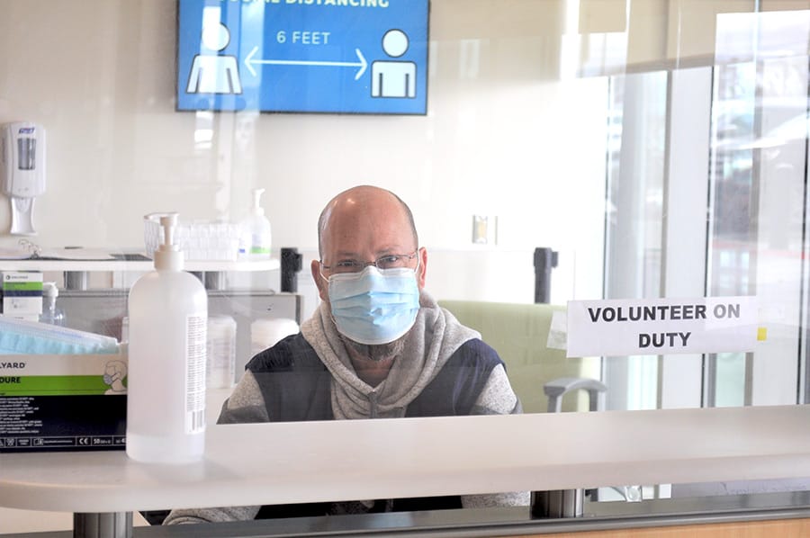 Volunteers are vital to local hospitals,  and they’ve been missed this year post image