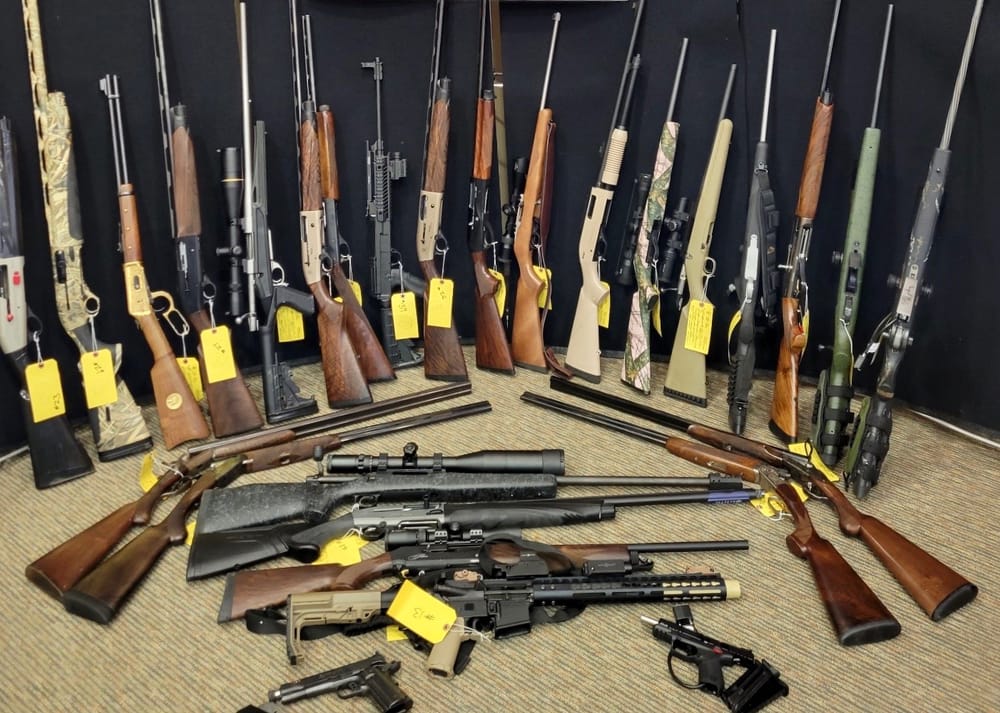 Hillsburgh residents charged after police seize guns from home post image