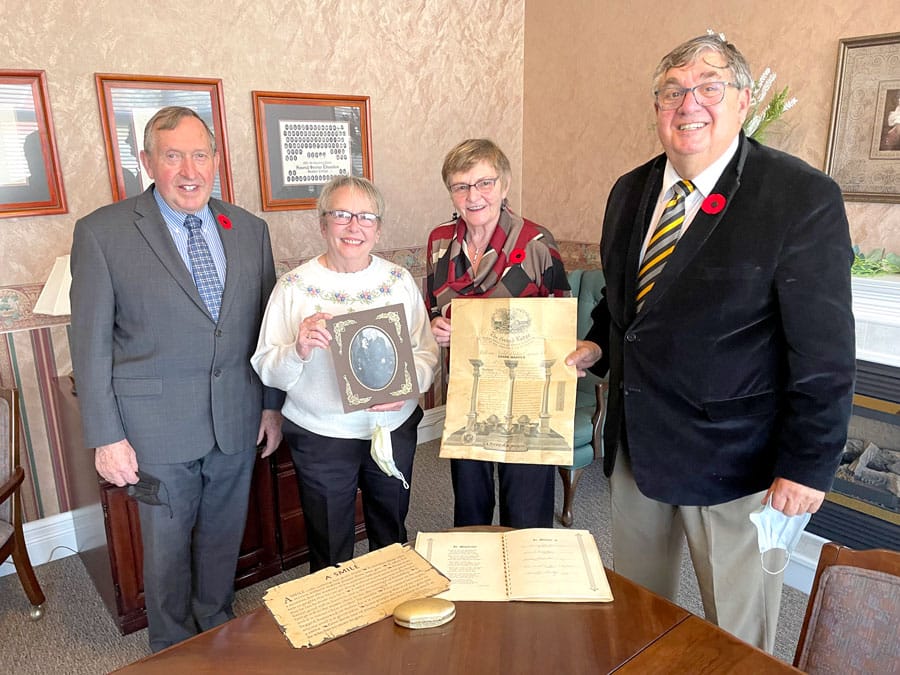 Century-old Mason certificate presented to local lodge officials post image
