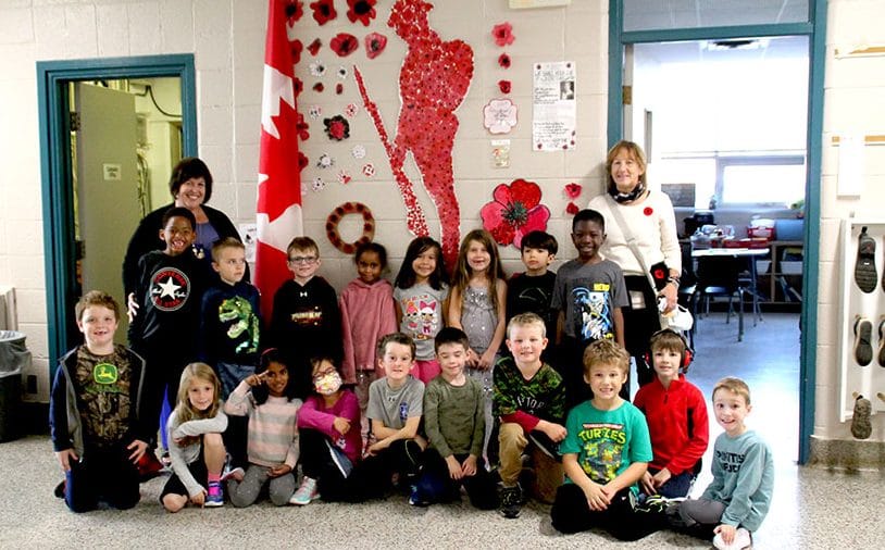 Remembrance starts with poppies, ends with respect at St. Mary Catholic School post image