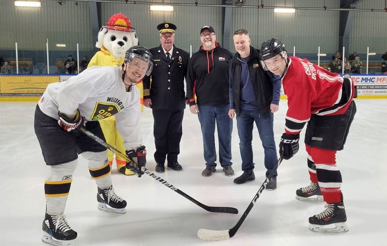 Firefighters beat police in charity hockey game post image