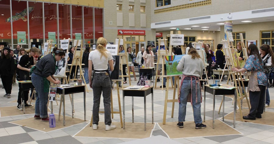 Students raced to paint canvasses during board-wide Live Art Battle at Centre Wellington District High School post image