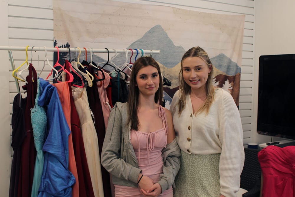 Students hold a Prom Dress Drive post image