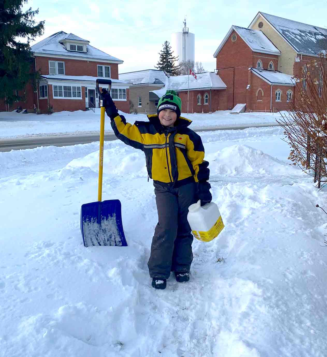 Nine-year-old hard at work shovelling snow for neighbours post image