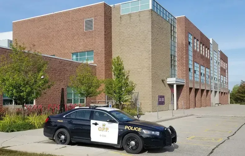 Province pushes boards to bring back school resource officers post image