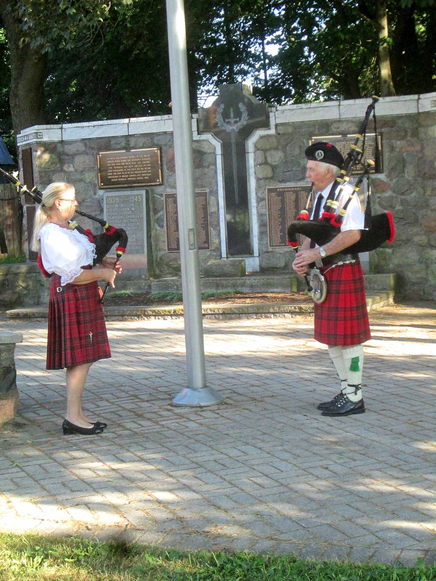 Pipers and dancers entertain crowd in Arthur
