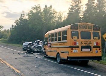 Erin man dies after school bus, car collide head on