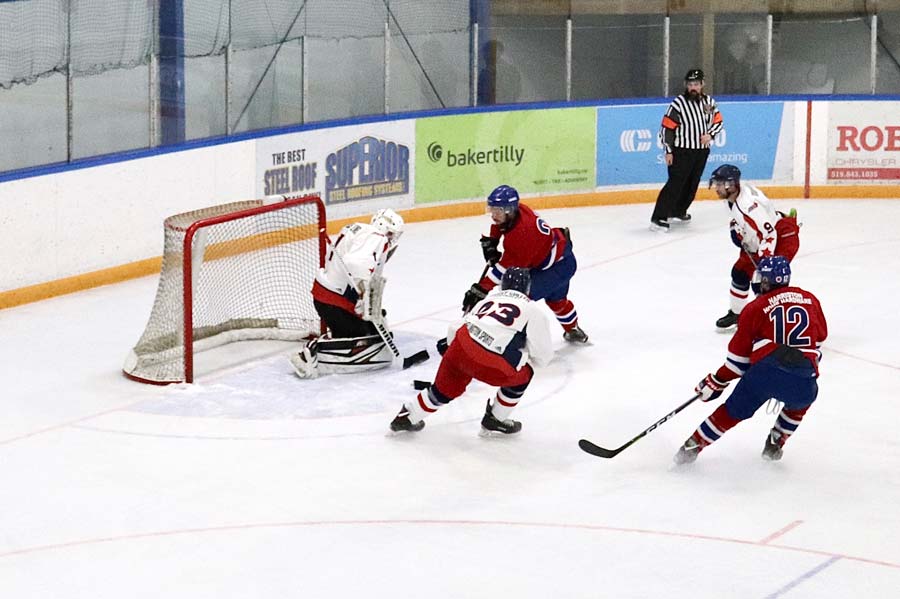 Wellington County's two entries in the Western Ontario Athletic Association's Senior hockey battled in Elora