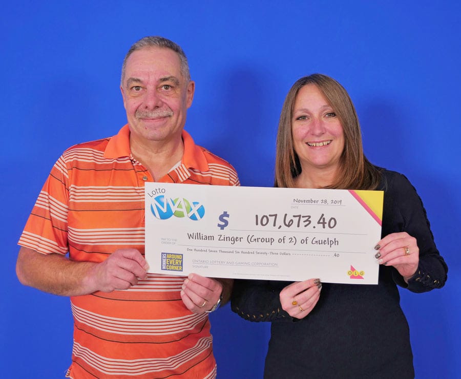 Friends collect Lotto Max winnings