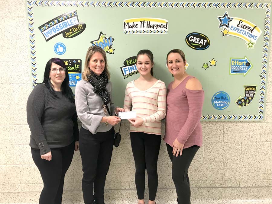 Graduating Grade 8 student provides support for breakfast program at Minto Clifford school