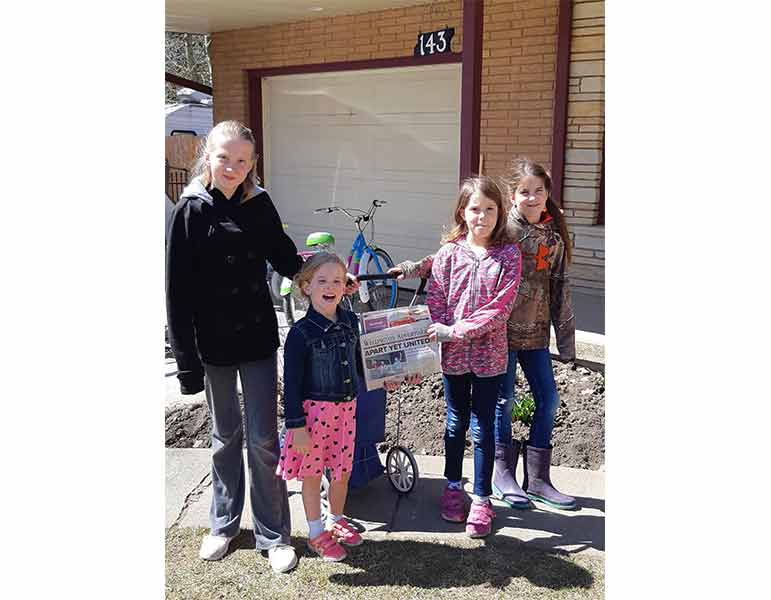 Local youths donate newspaper route pay to hospital