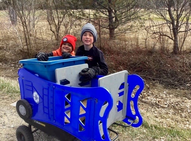 Local boys take on roadside cleanup to recognize Earth Day