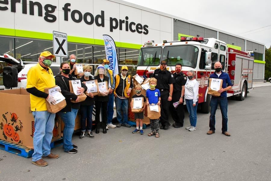 Food bank food drive a team effort, raising $2,700