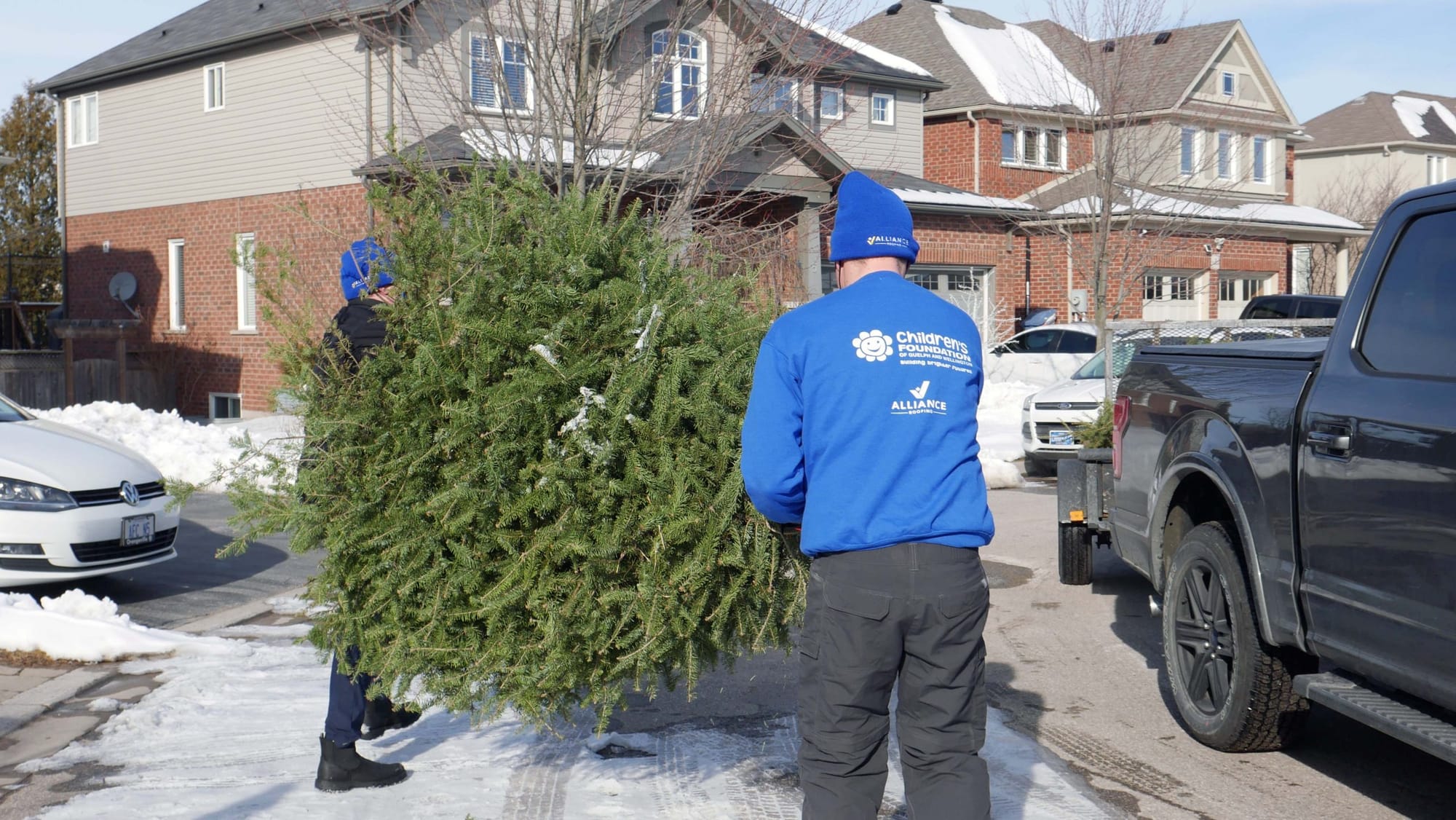 Old Christmas trees (plus volunteers) raise $93,000 for Trees for Tots