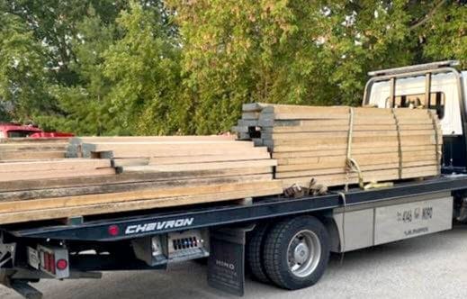 Three charged with fraud after $100,000 lumber purchase