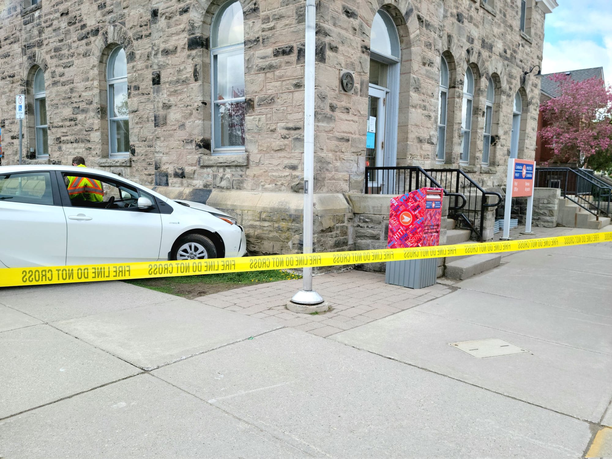 Vehicle runs into pedestrian, library
