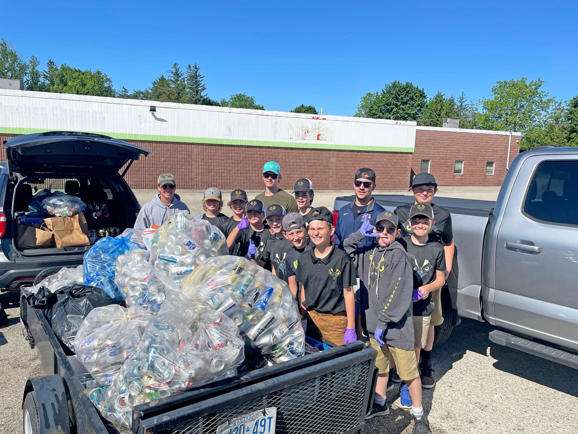 Minor lacrosse team holds can/bottle drive