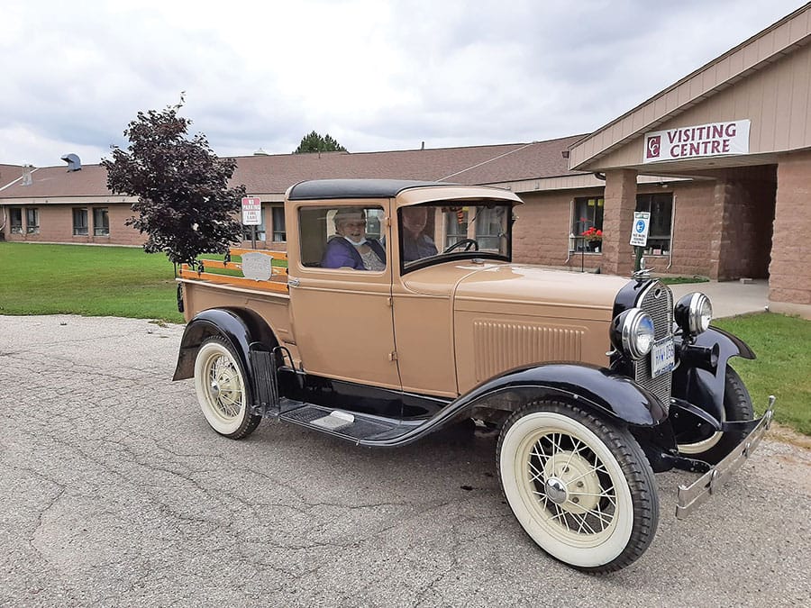 Caressant Care Arthur residents treated to car show