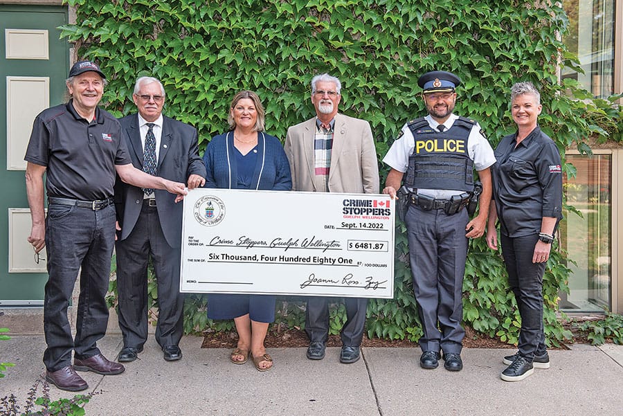 Wellington County Police Services Board presents funds to GSGW