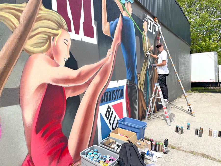 Blaze Wiradharma creates sports-themed mural in Harriston