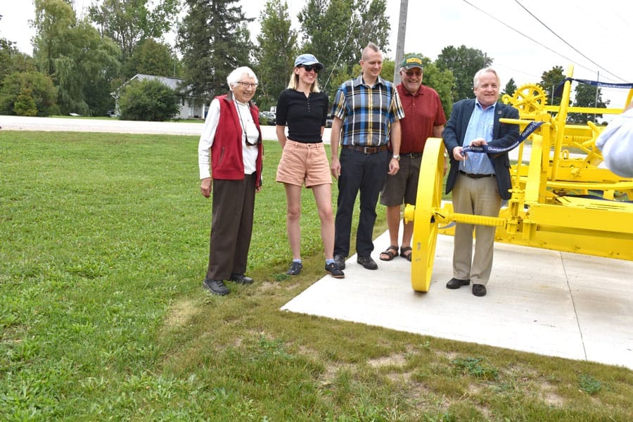 Guelph Eramosa Township cuts ribbon on century-old road grader