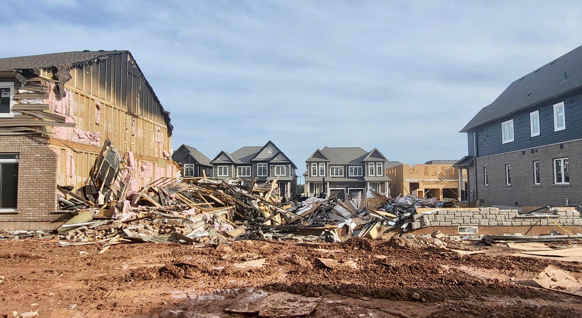 Suspicious fire destroys multiple homes in Erin development