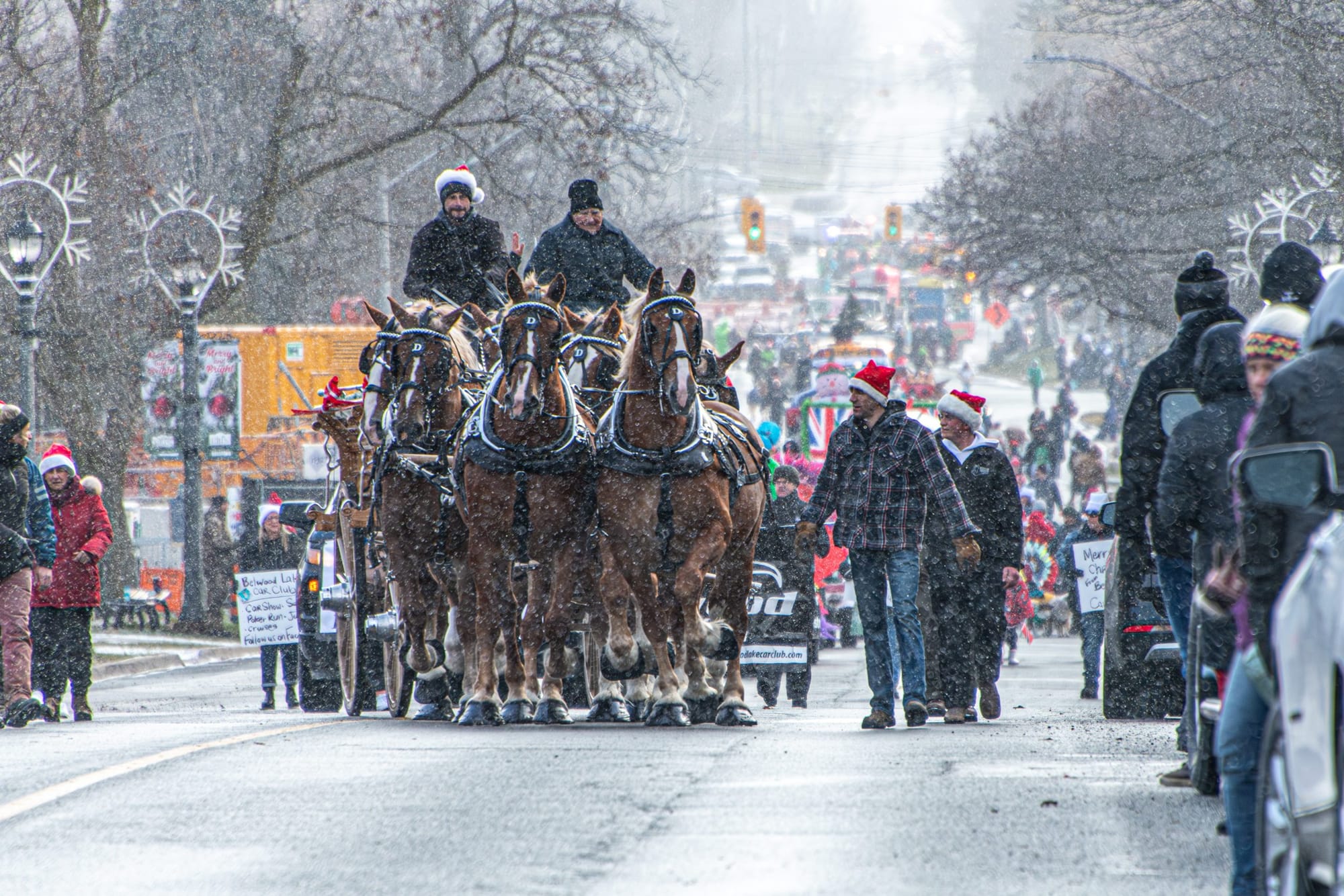 Festive flakes fall on Erin Santa Claus parade