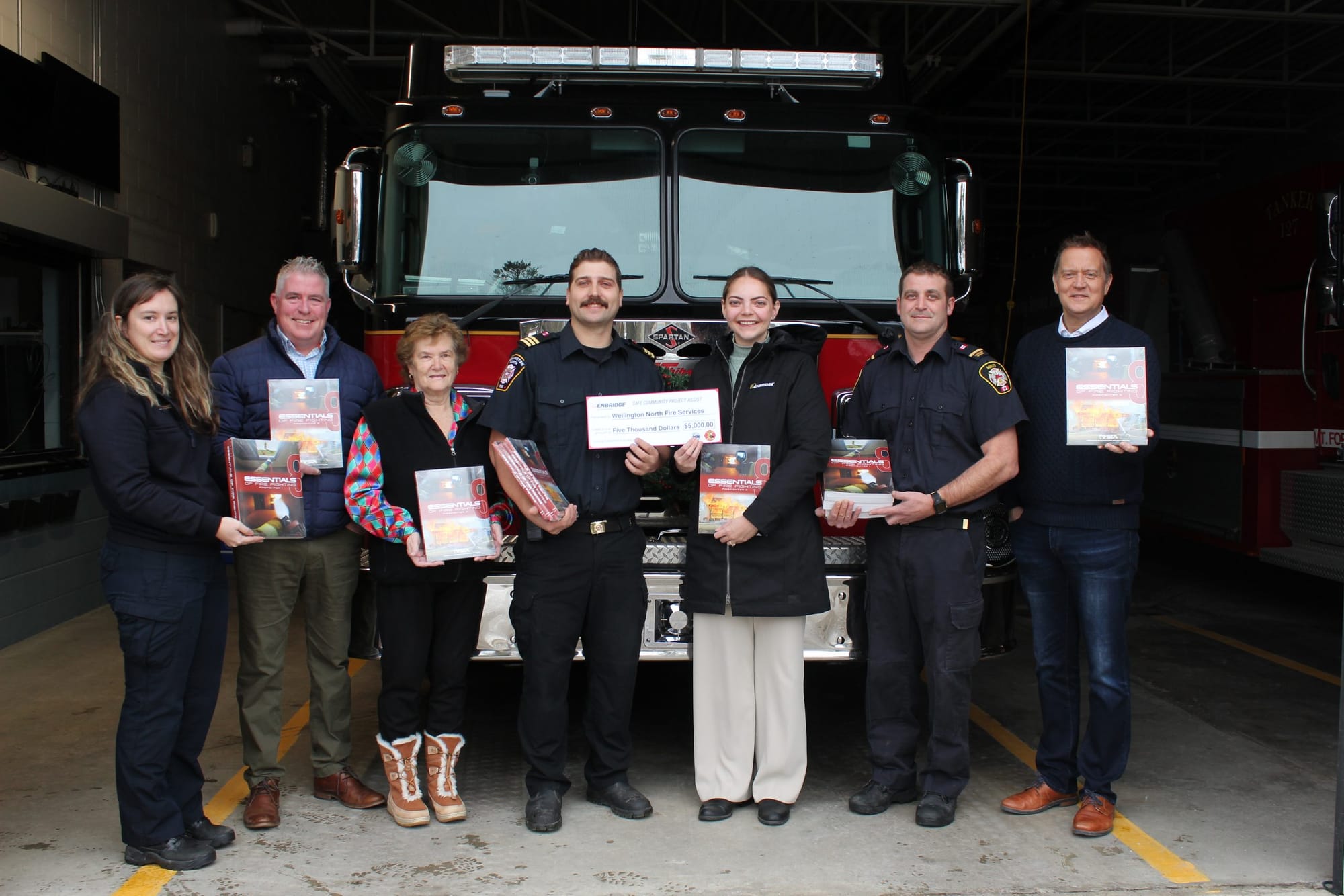 Enbridge Gas donates $5,000 worth of textbooks to Wellington North Fire Services