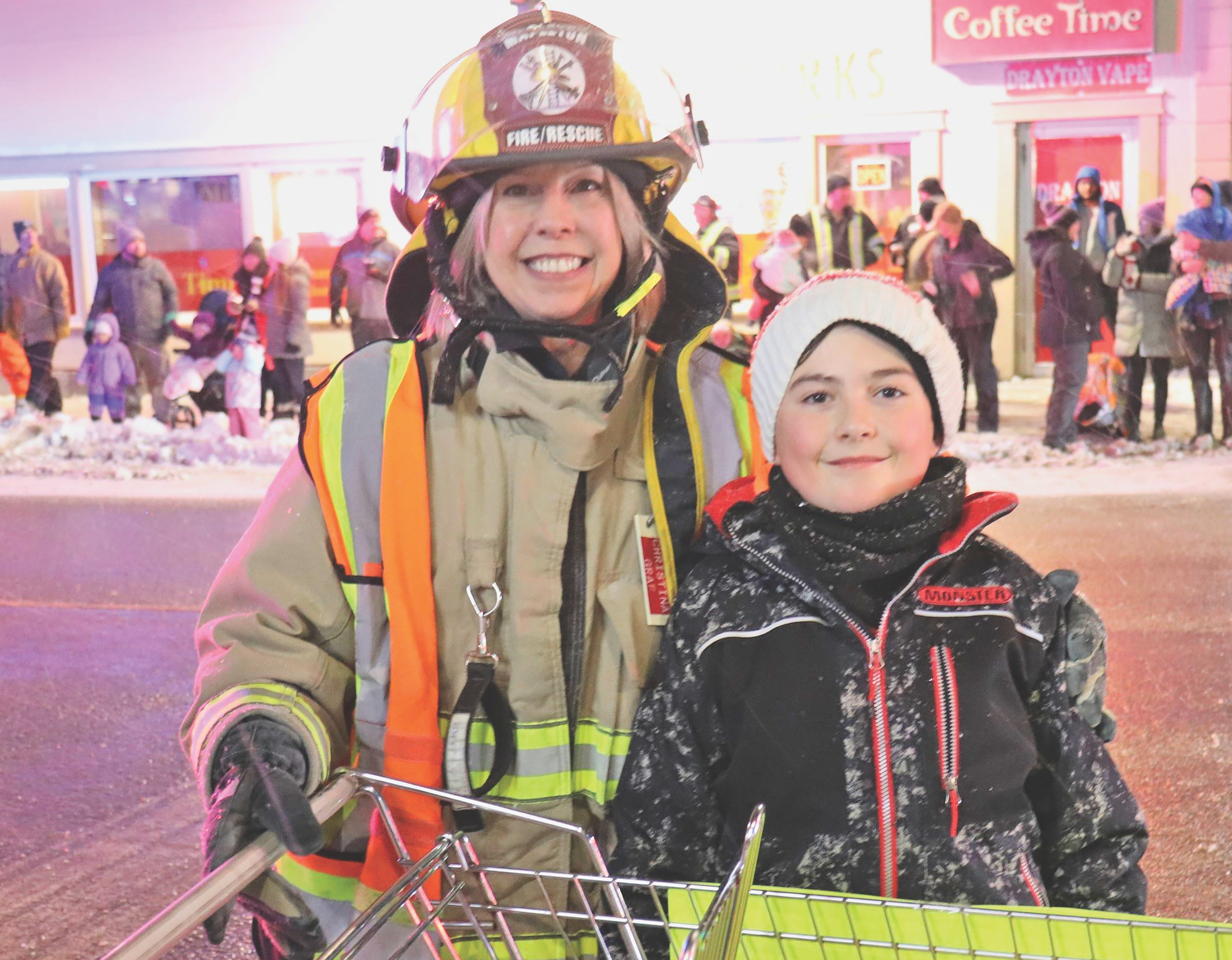 Santa and Mrs. Claus bring snow to Drayton’s annual parade