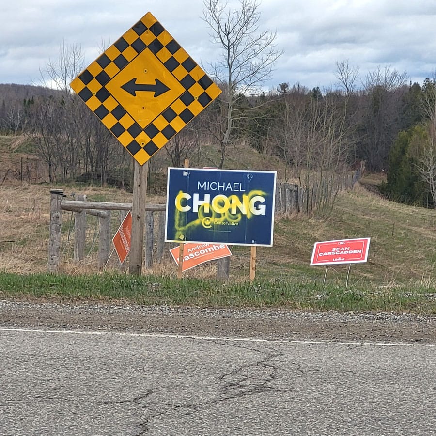 Defaced election sign