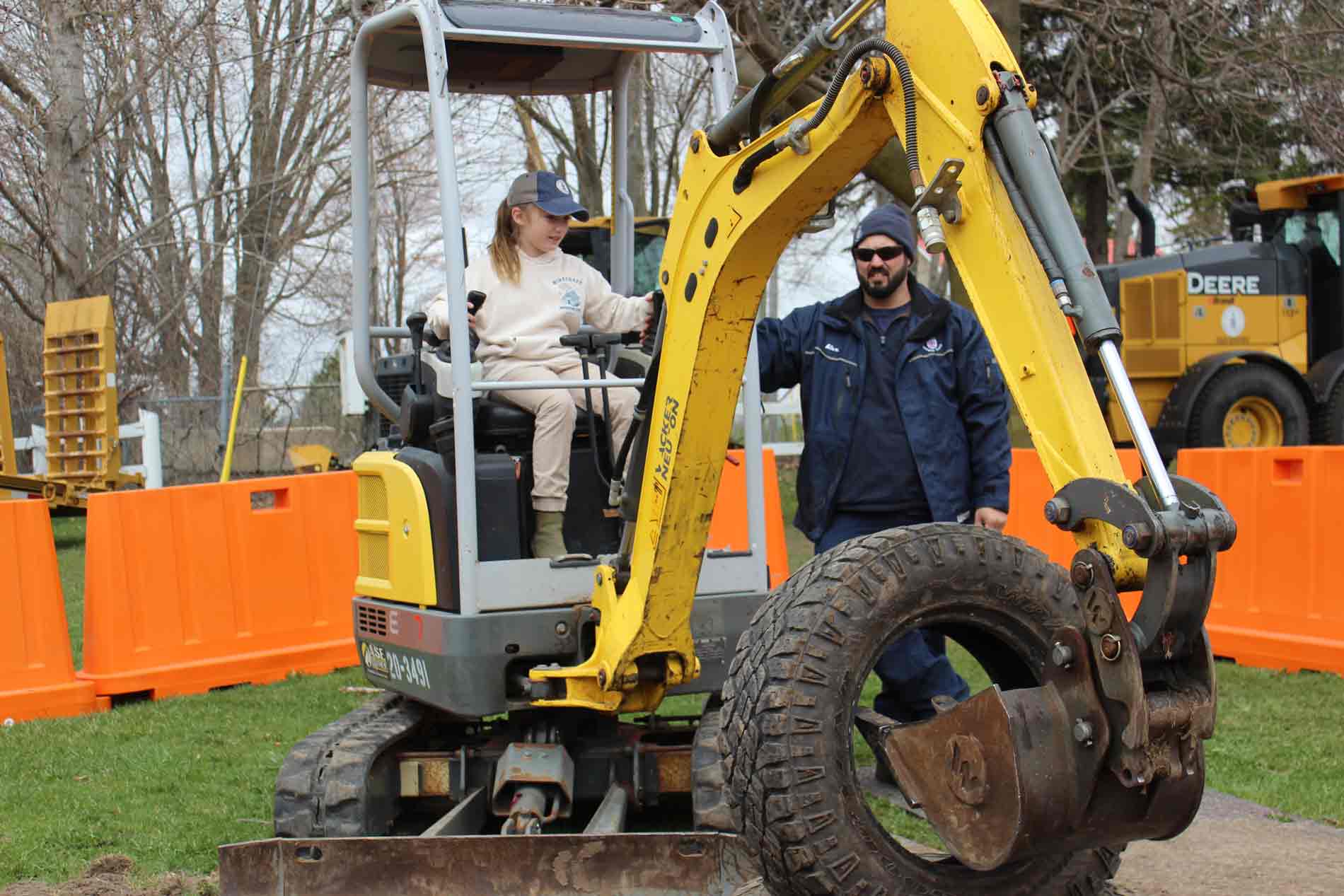 Tradespeople set up for the Trade Tracks Showcase