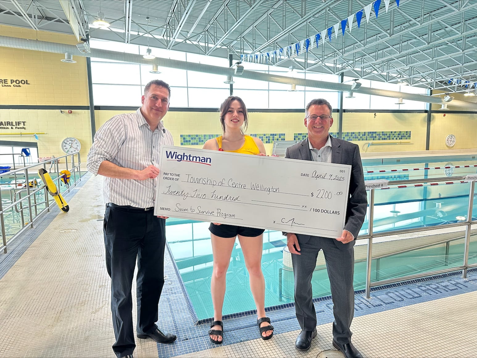 Wightman donates $2,200 to the Centre Wellington Swim to Survive program