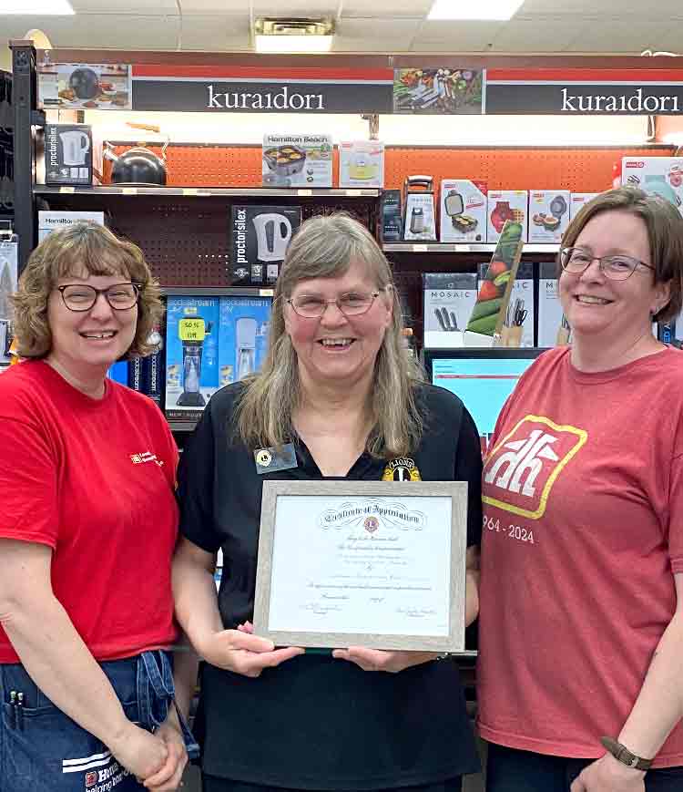 Clifford Lions present certificates to local businesses