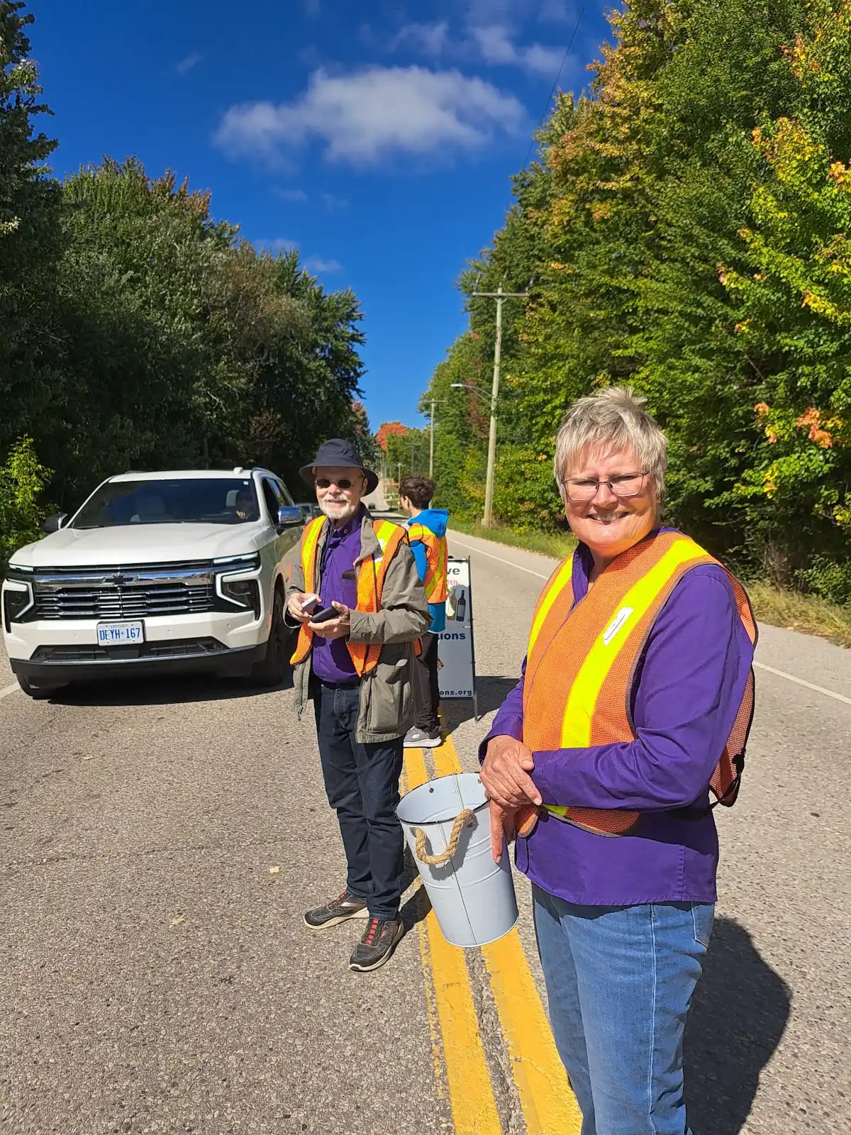 Belwood and District Lions Club collect “tolls” at the Belwood Bridge