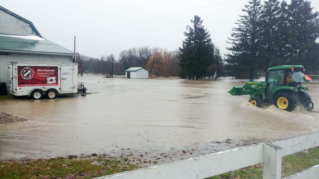 Record rainfall causes flooding, power outages across county